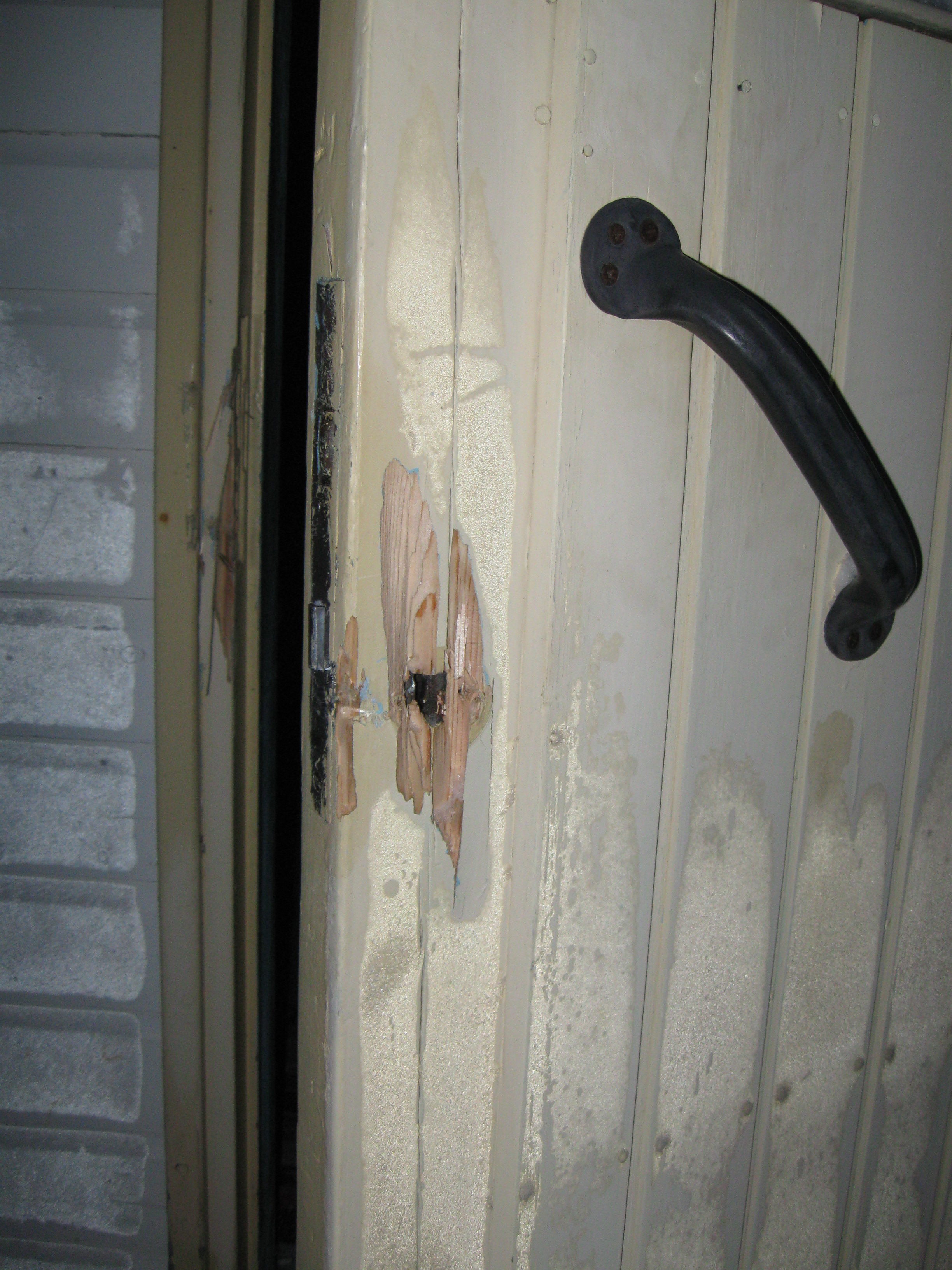 A door lock broken during an attempted burglary.