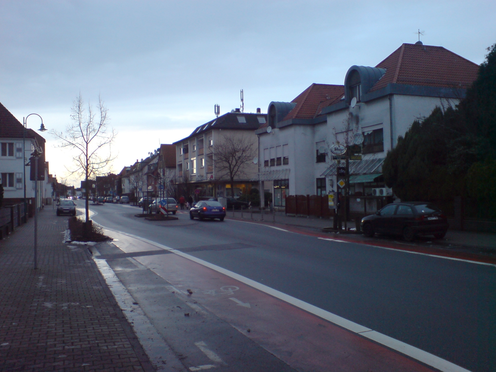 The Bahnstrasse ('Railway Street', the main street) of Erzhausen during winter 2009 in Germany . Looking west in the centre of the village.